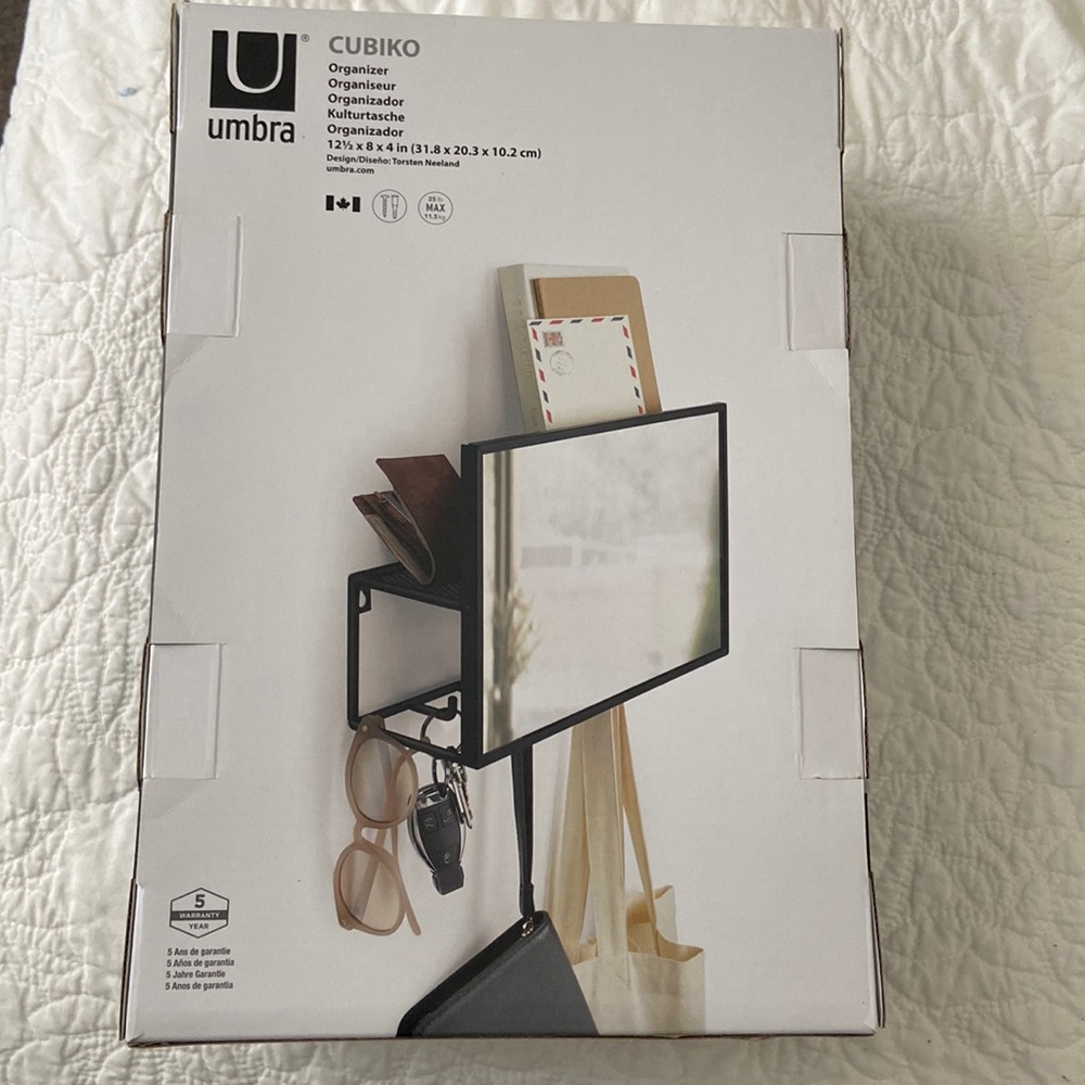 Organizer for use in hallways, entries, bedrooms. Modern look. Holds a lot